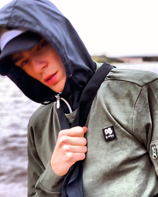 The DB rubber patch coach sweater